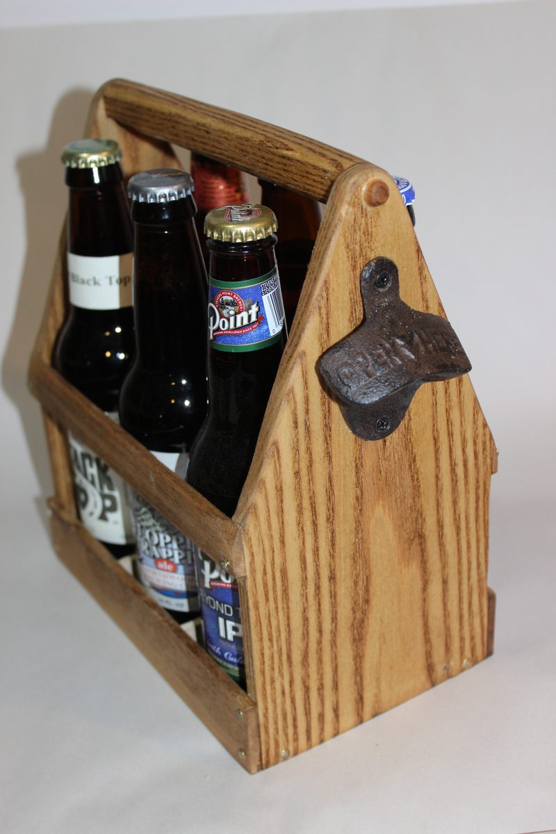 Wooden bottle carrier with a dowel handle and a cast-iron bottle opener